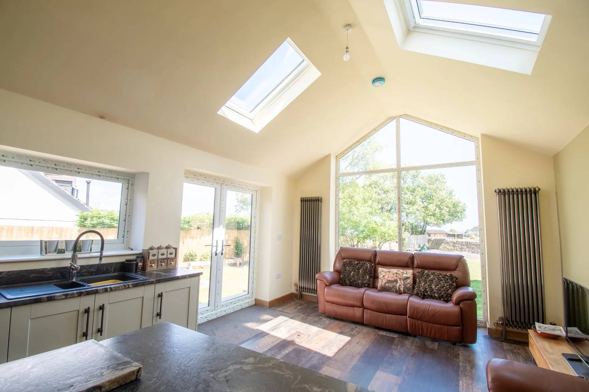 Vaulted living space with full-height gable glazing, Cresswell